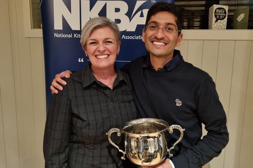 Sushil Patel holding the Judy Bark Cup with BCITO Training Advisor Michele Saunders
