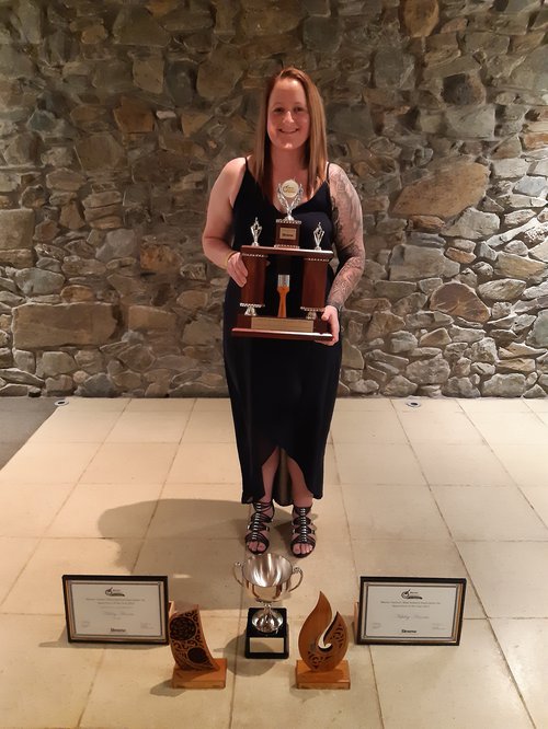 Ashley Harris with her trophies